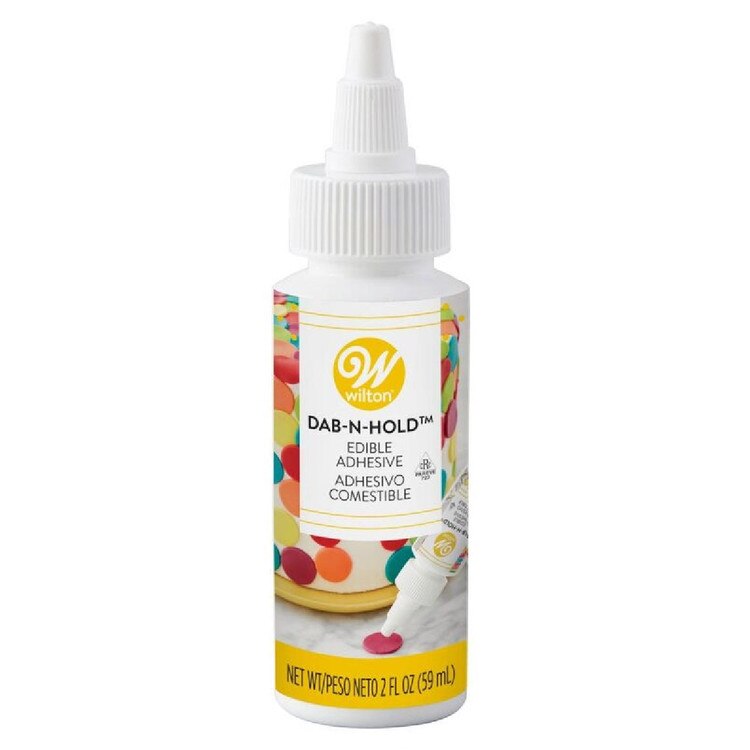 610-927 Wilton Dab-N-Hold Edible Ad